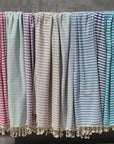 Bronte turkish towels in 12 colours hanging