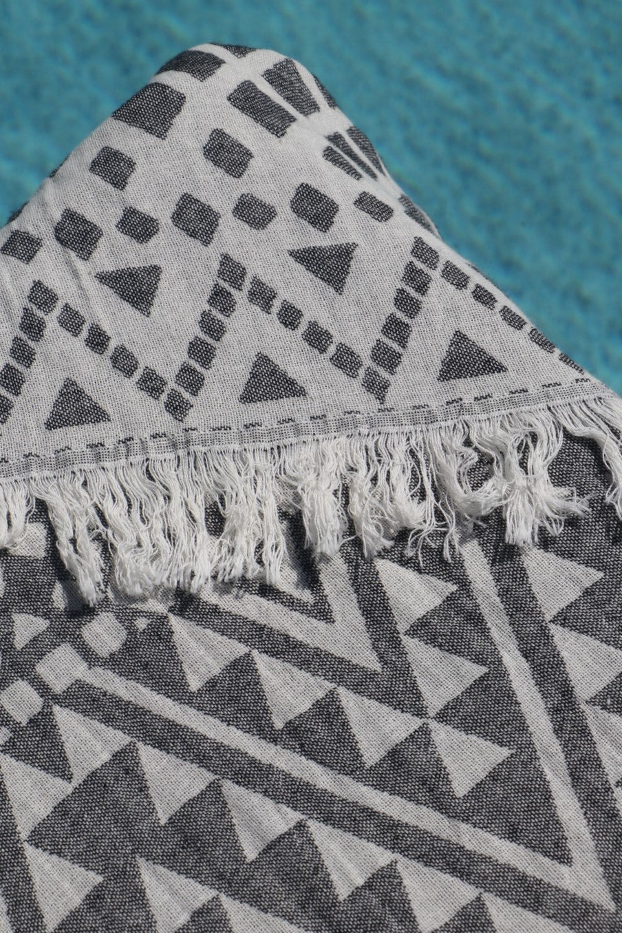 black burleigh beach towel close up