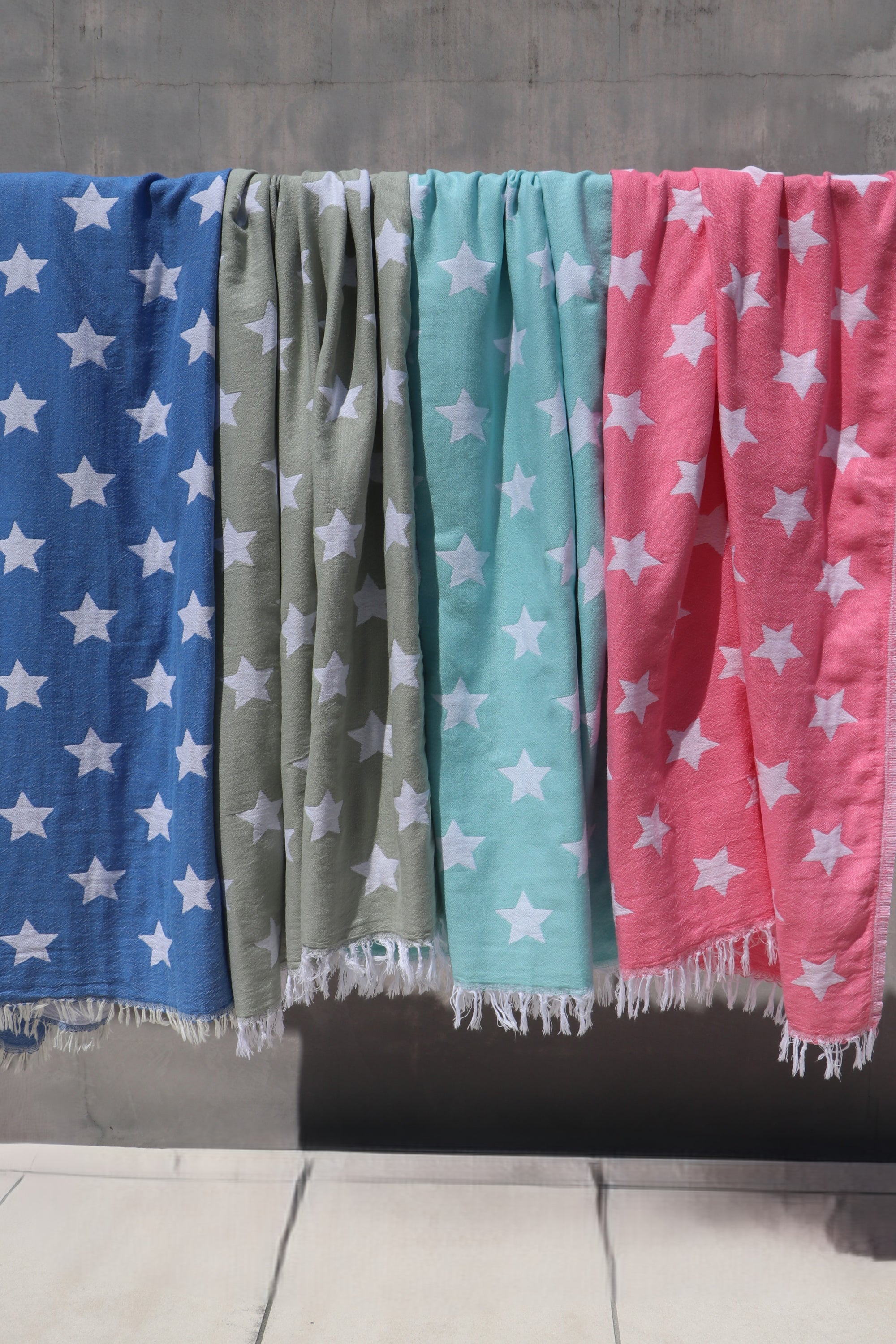 Twilight turkish towel in 4 colours hanging
