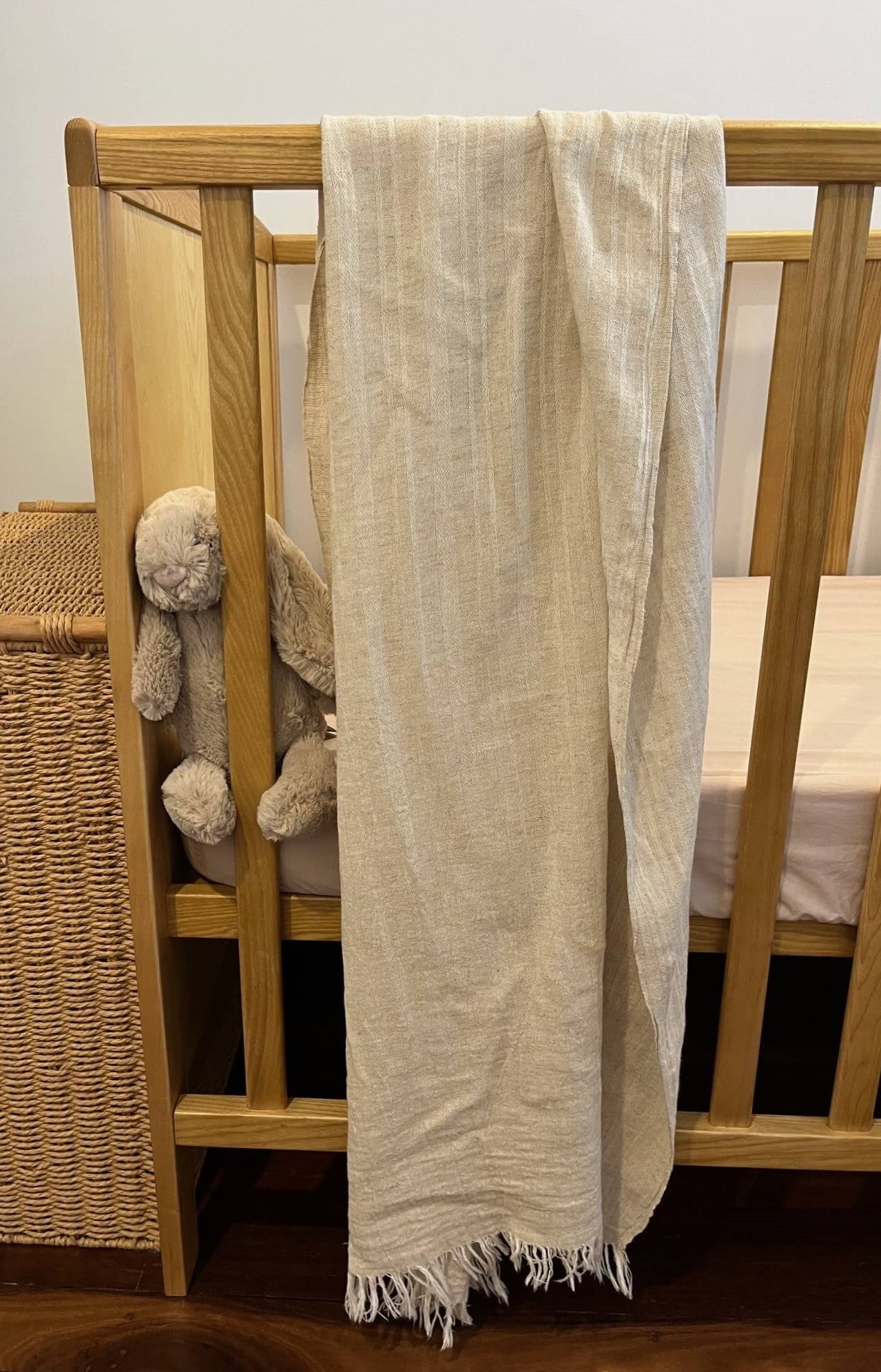 Broome scarf displayed on a cot