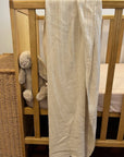 Broome scarf displayed on a cot