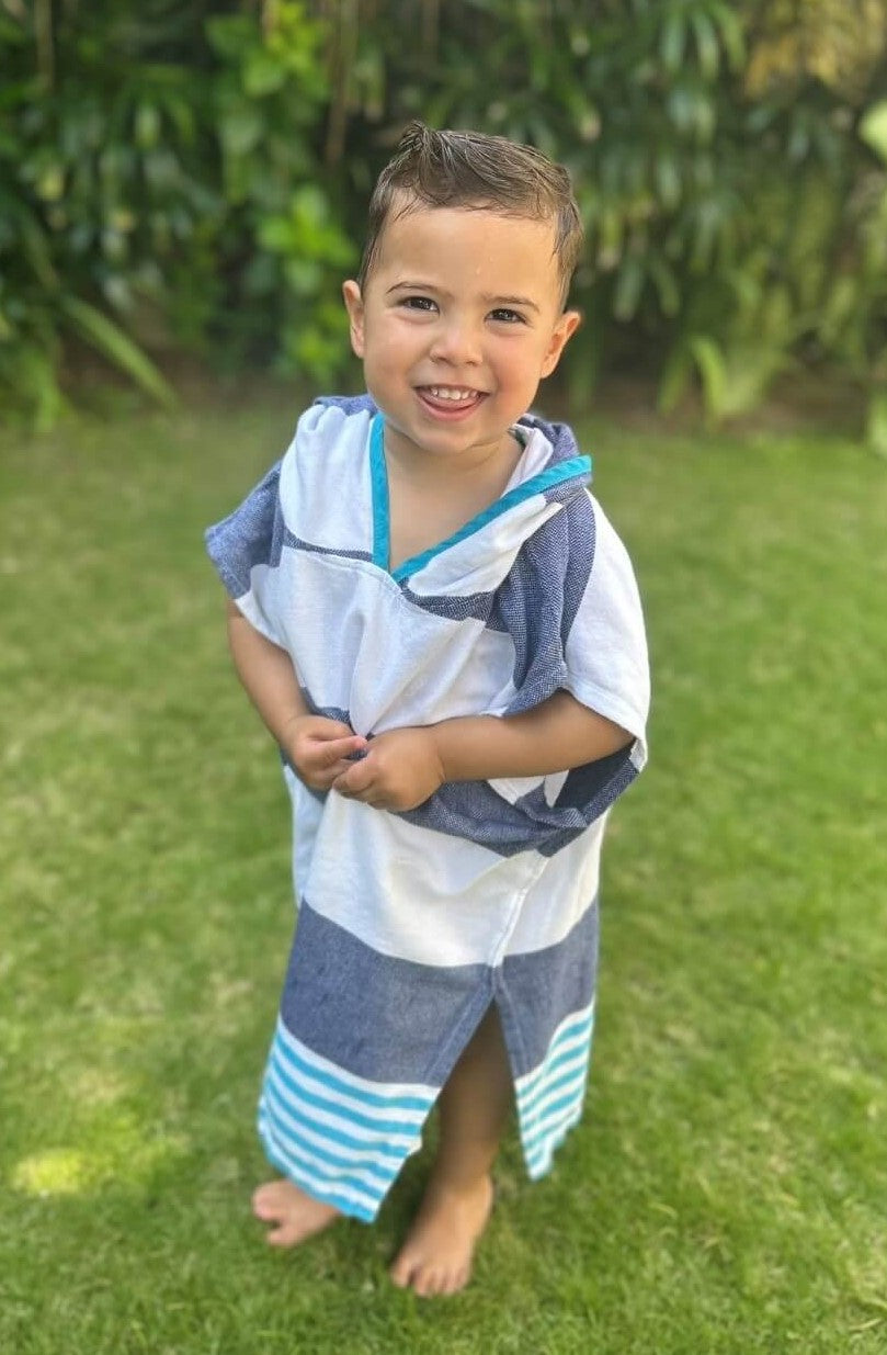 boy wearing Noosa hoodie